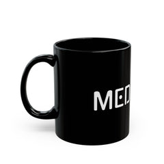 Black mug with 'MED' printed on it against a white background