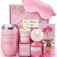 Collection of pink gift items including a tumbler, candle, bath bomb, soap, and card with 'Best Wishes for you' on a white background.