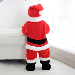 Child wearing a red Santa Claus costume standing on a light-colored floor.