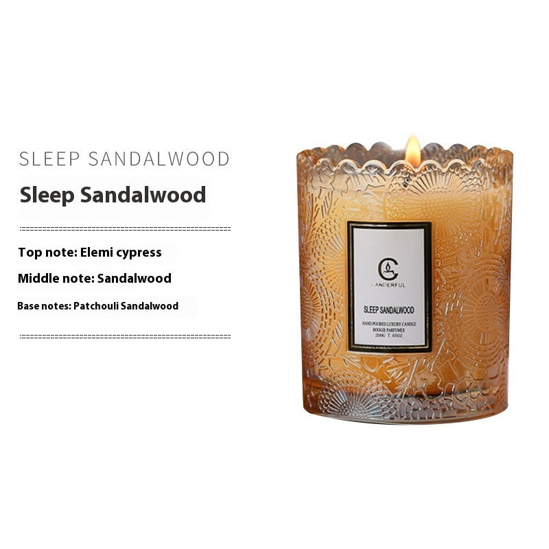Sleep Sandalwood candle with decorative glass and label on a white background