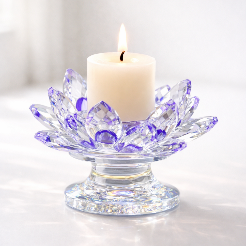 Candle in a decorative glass holder on a white background