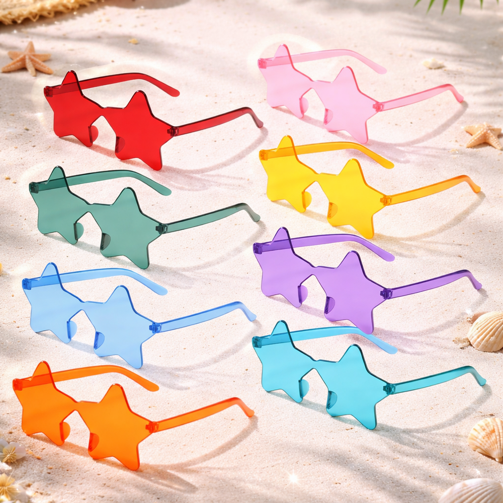 Colorful star-shaped sunglasses on a sandy surface with beach elements.