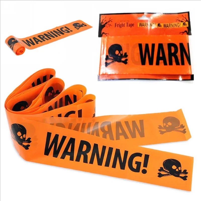 Orange warning tape with black text and skull designs on a white background