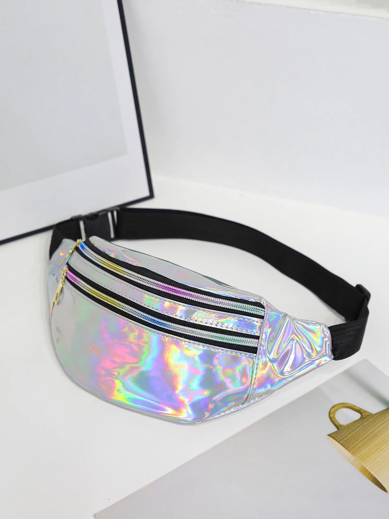 Holographic fanny pack on a white background