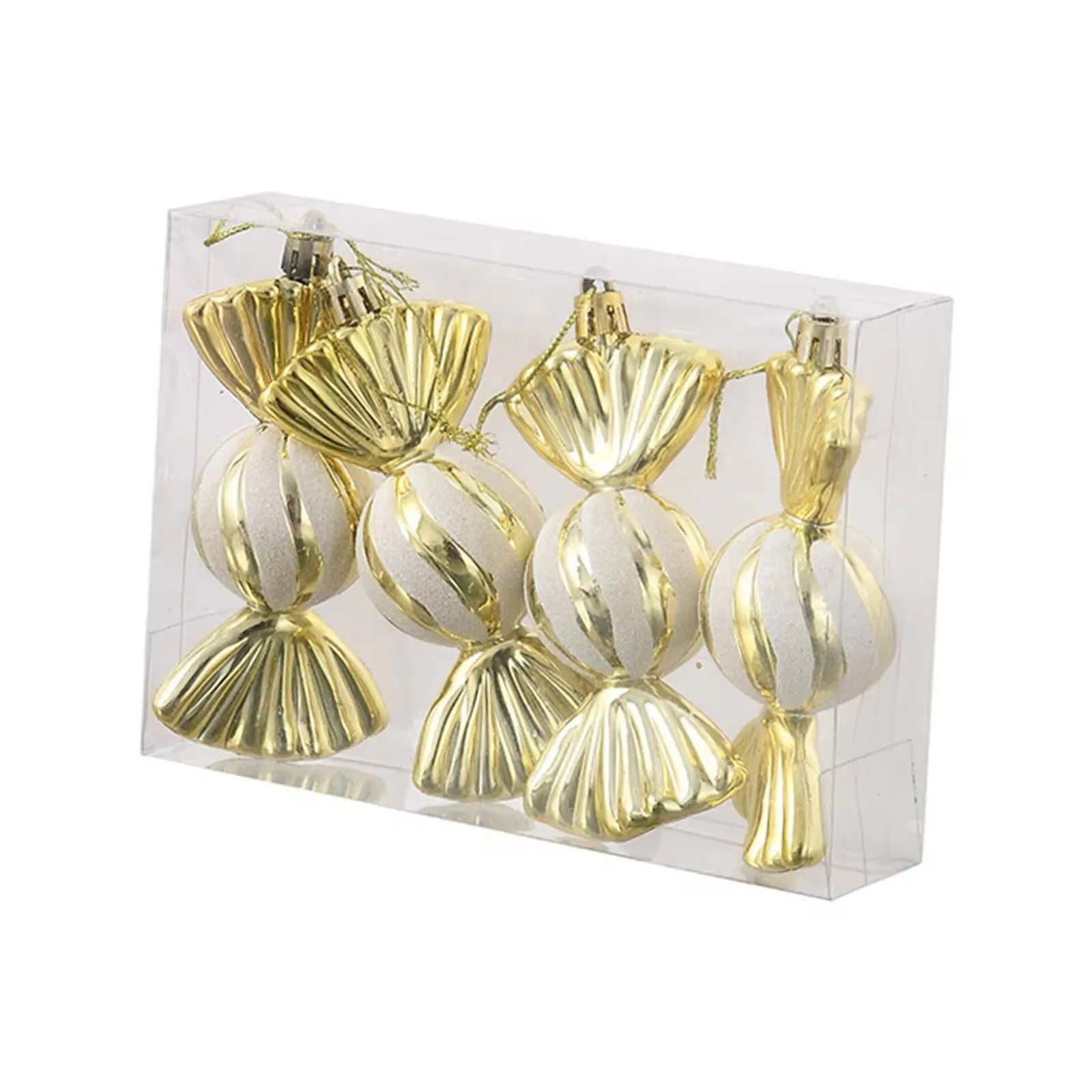 Set of gold and white striped ornaments in a clear box on a white background