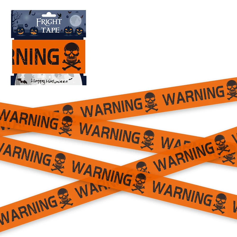 Halloween-themed warning tape with skull and crossbones design, displayed with packaging.