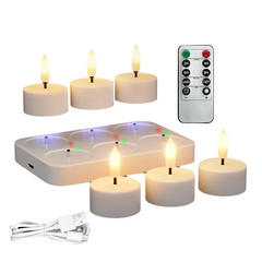 Set of LED candles with remote control on a white background