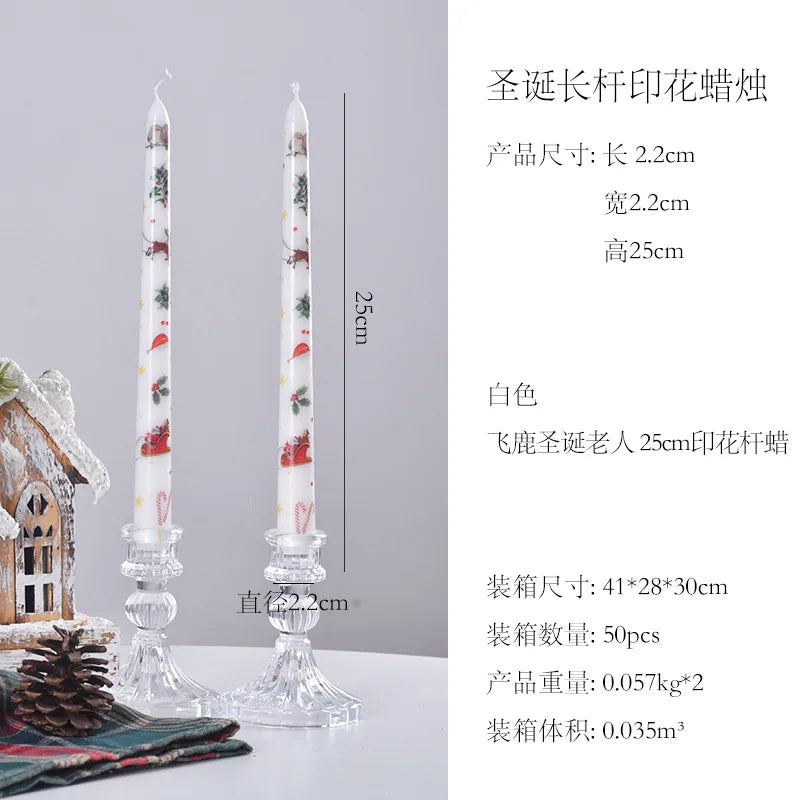 Decorative candles with Christmas design on a gray background