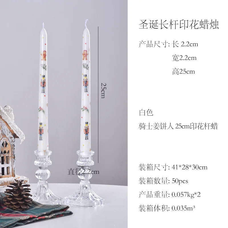 Two Christmas-themed candles with decorative figures on a gray background, accompanied by product dimensions and packaging details.