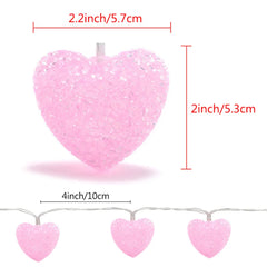 Pink heart-shaped lights with measurements on a white background