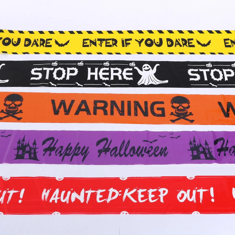 Set of Halloween-themed caution tapes with text and graphics on a white background