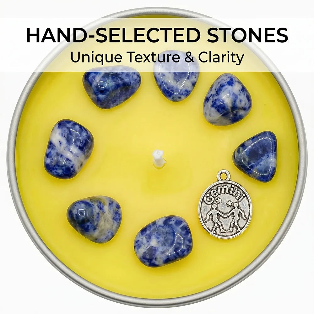 Hand-selected stones on a yellow candle with a 'Gemini' pendant.