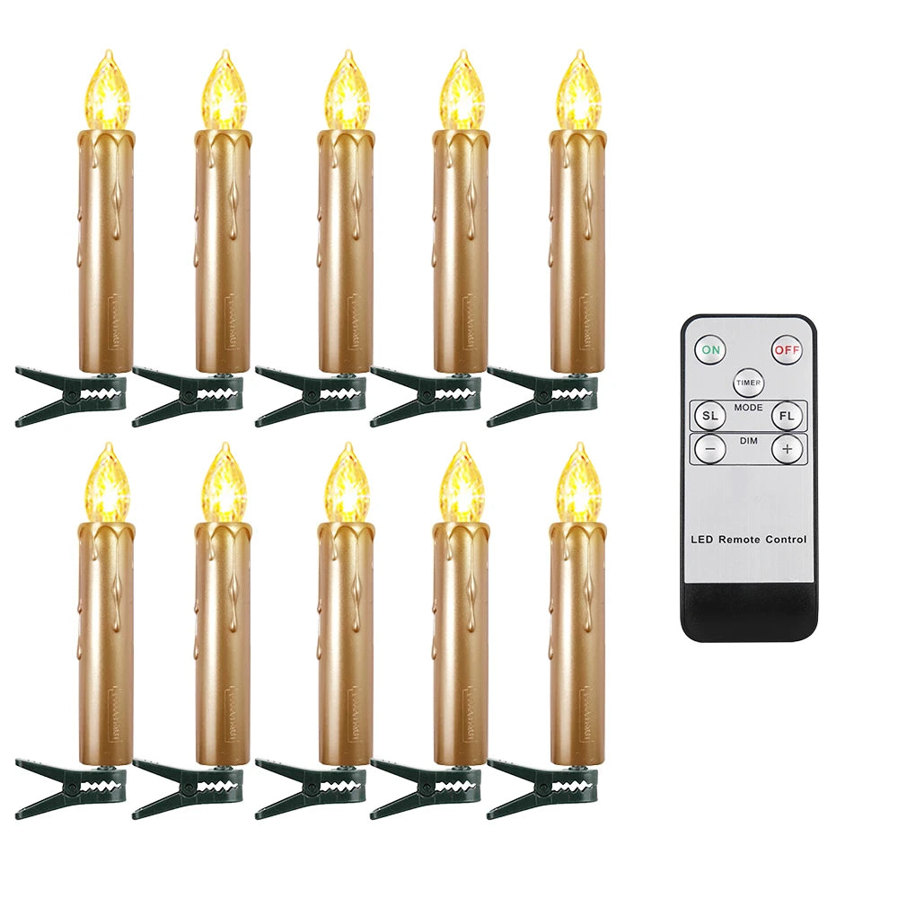 Set of gold LED candles with remote control on a white background