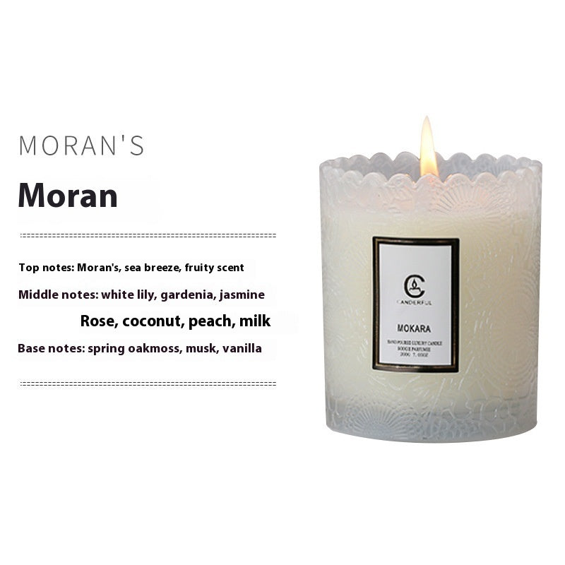 Candle with a label on a white background, featuring the brand 'Moran'.